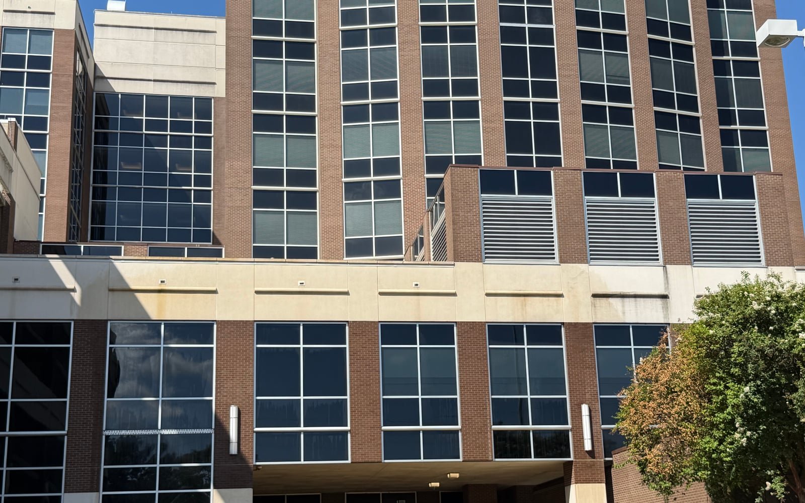 Multistory commercial building assessed for exterior cleaning work.