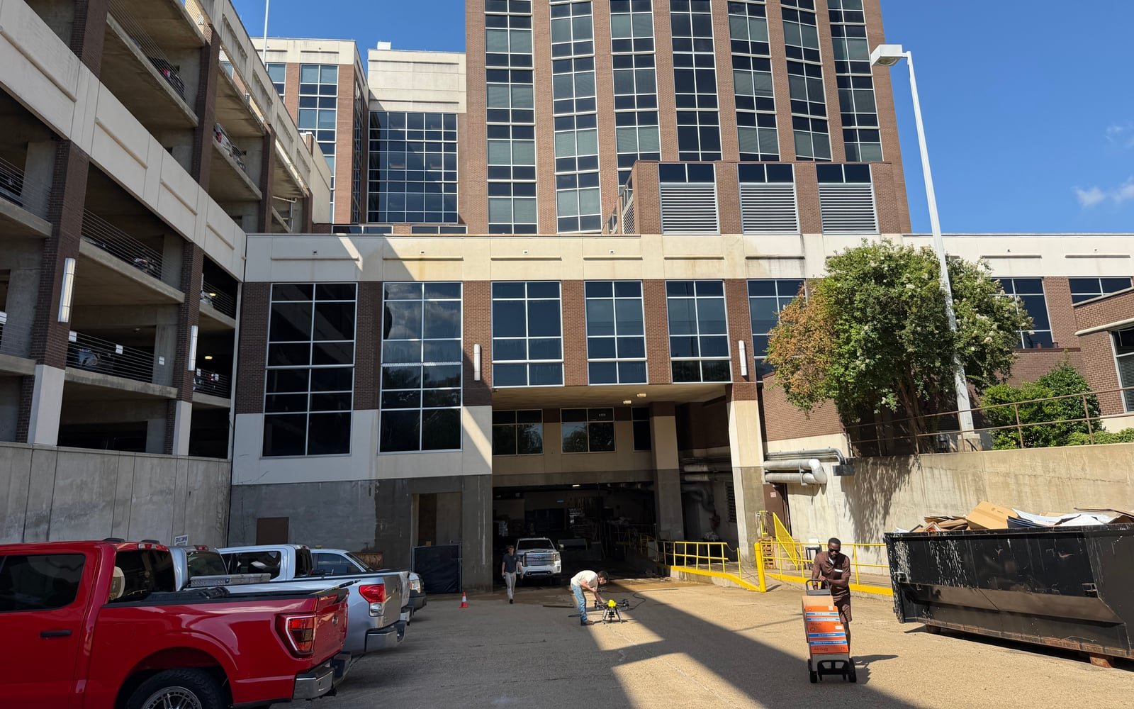 Commercial property facade viewed from the ground before exterior cleaning assessment.